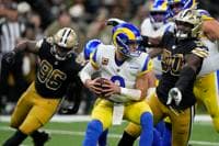 Saints Defensive linemen Tanoh Kpassagnon (90) and Carl Granderson (96) pressure Rams QB Matthew Stafford (9). Credit: Idaho State Journal
